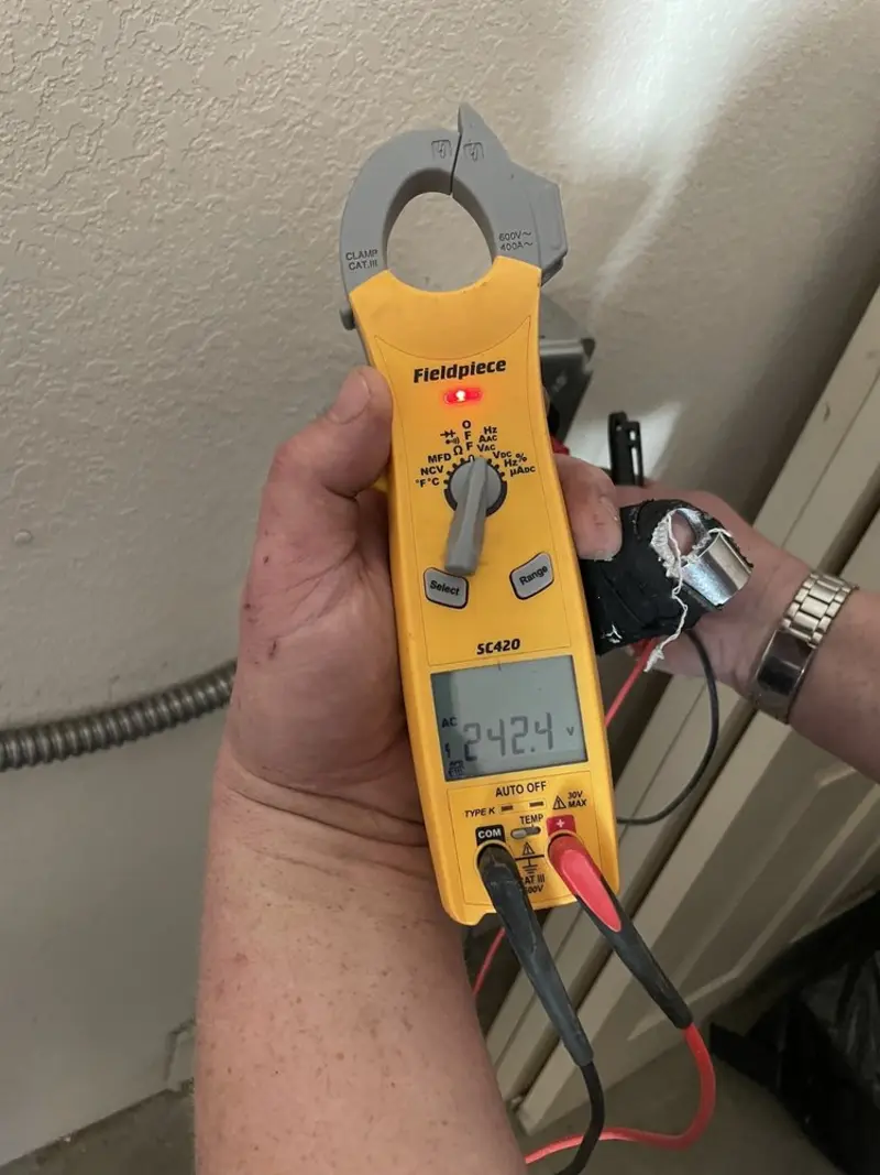Voltage testing with clamp meter during Recessed Lighting Installation in Oracle
